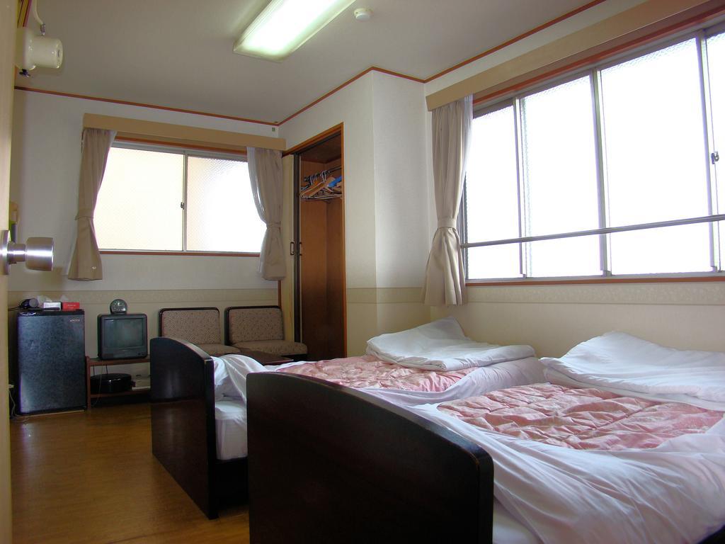 Hotel Yamabe Tenri Habitación foto