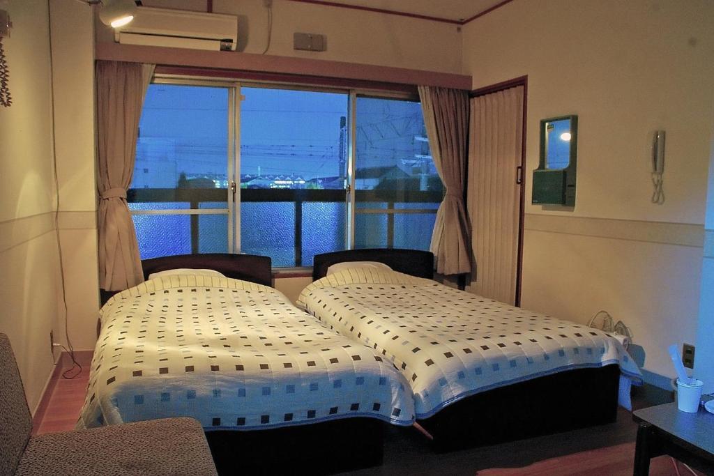 Hotel Yamabe Tenri Habitación foto